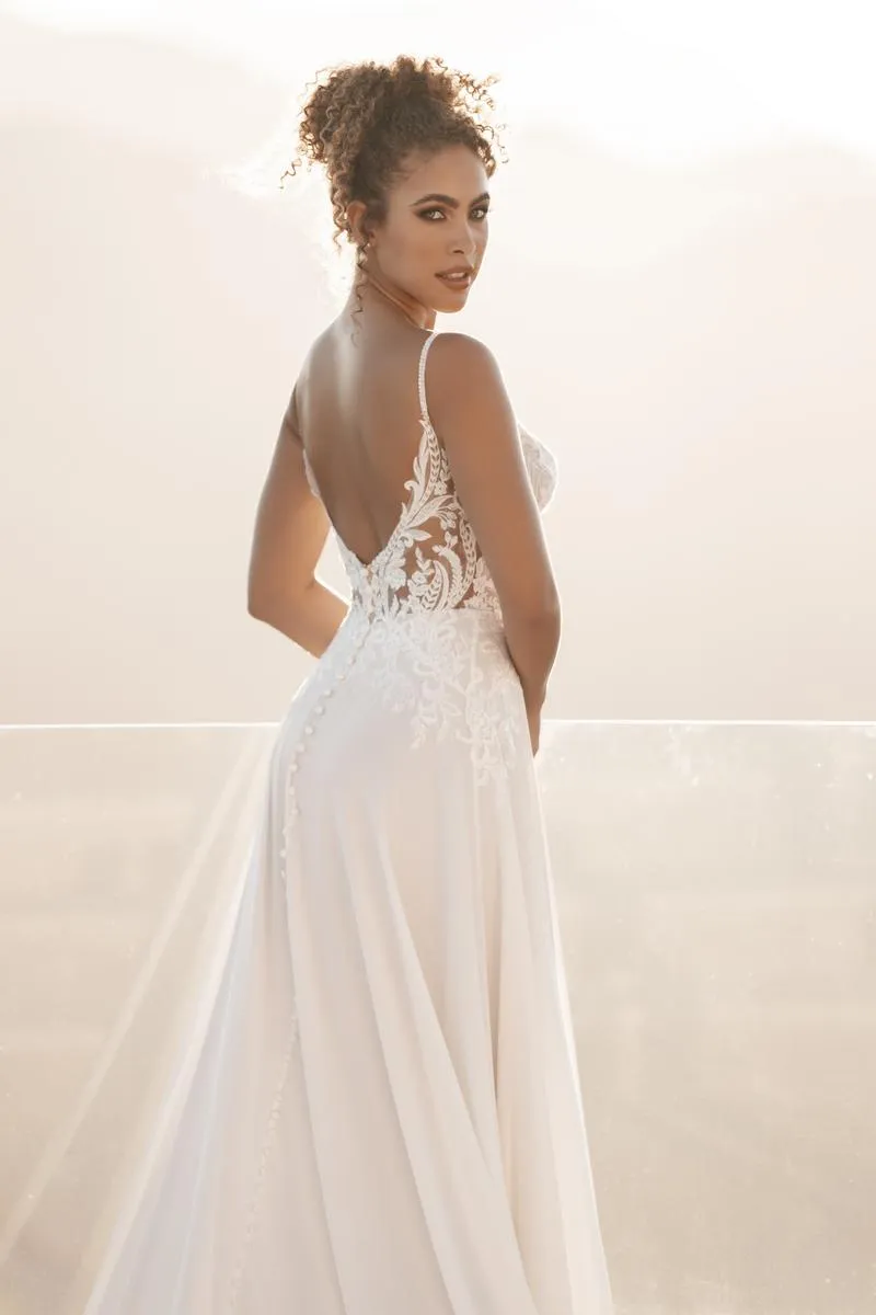 Sure! Here is the optimized title for the e-commerce product Allure Bridals Dress A1209: Elegant Allure Bridals A1209 Wedding Dress with Delicate Lace Details.
